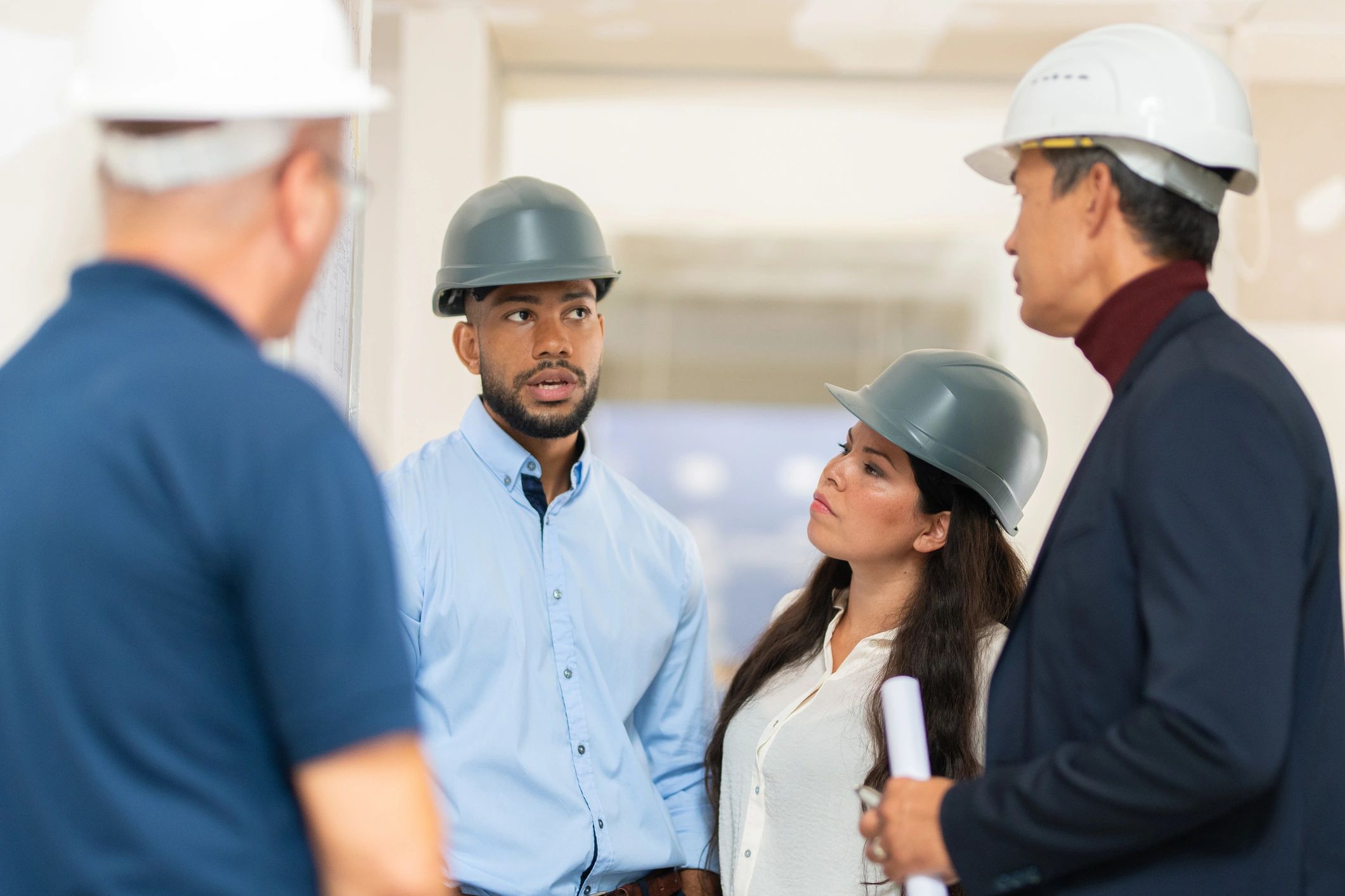 Team members discussing plans together