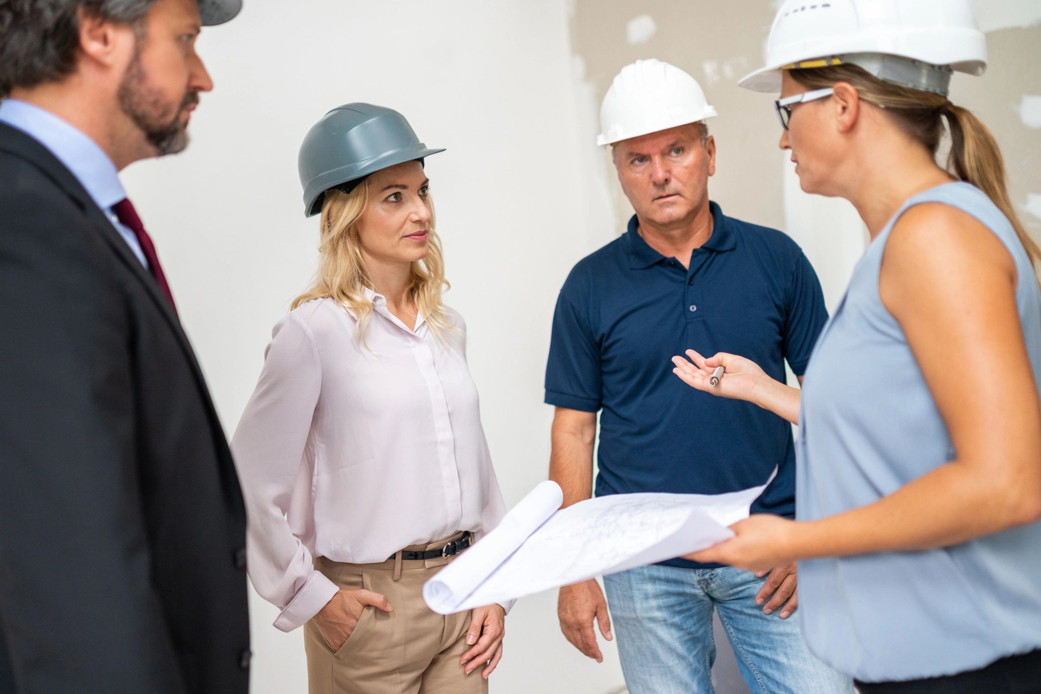 Professionals discussing plans together