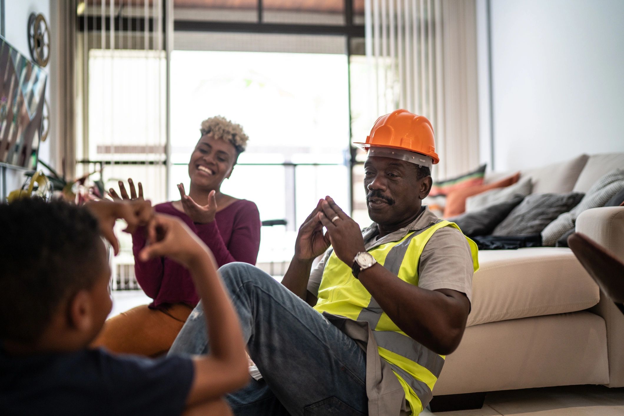 Homeowners together in a living room