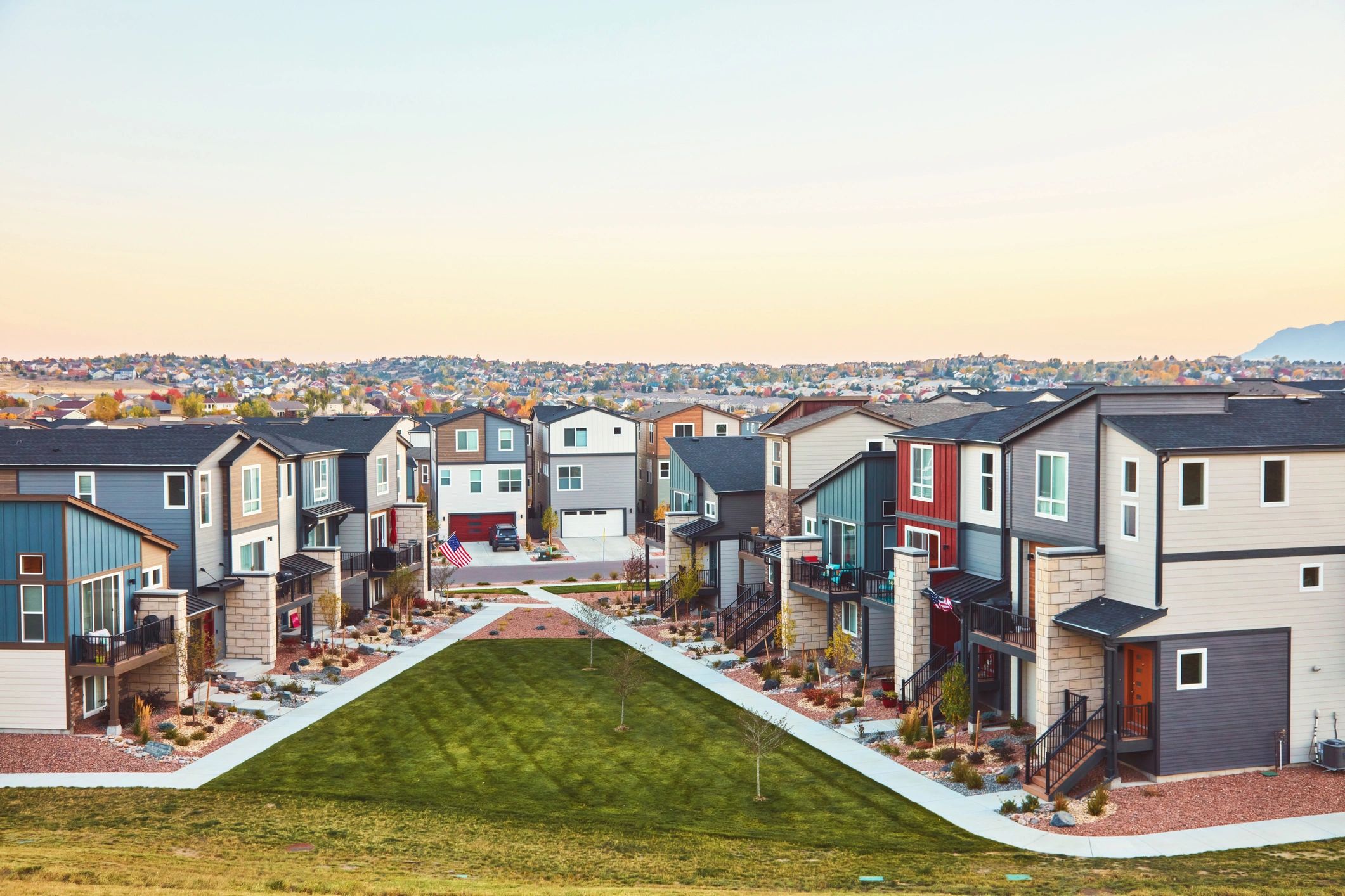 Residential community with modern homes at sunrise