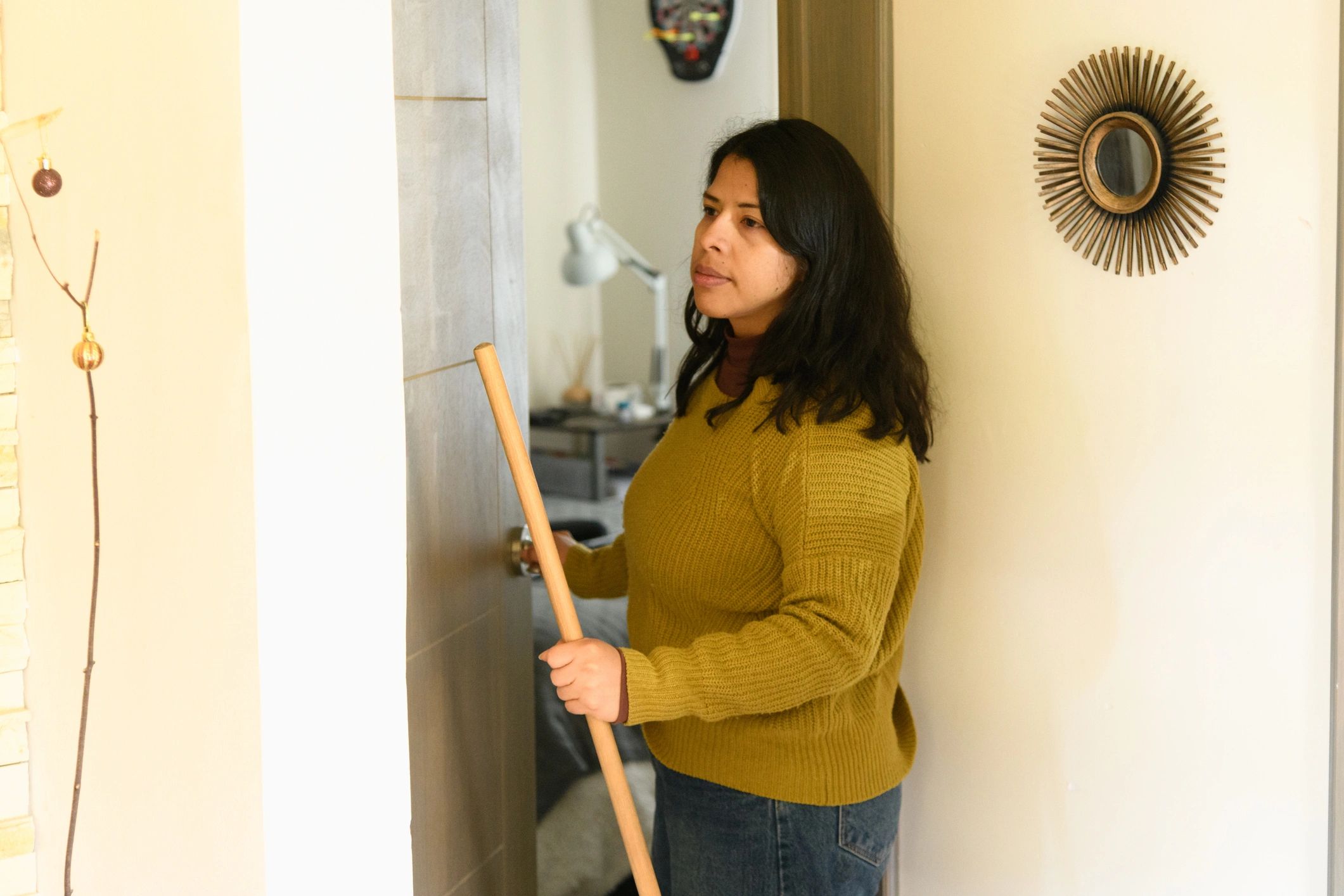 Homeowner entering a room at home